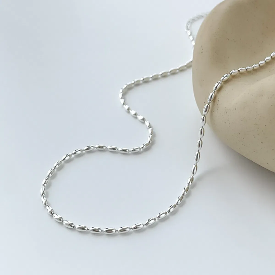 Простое повседневное многослойное колье с цепочками в виде рисовых зерен