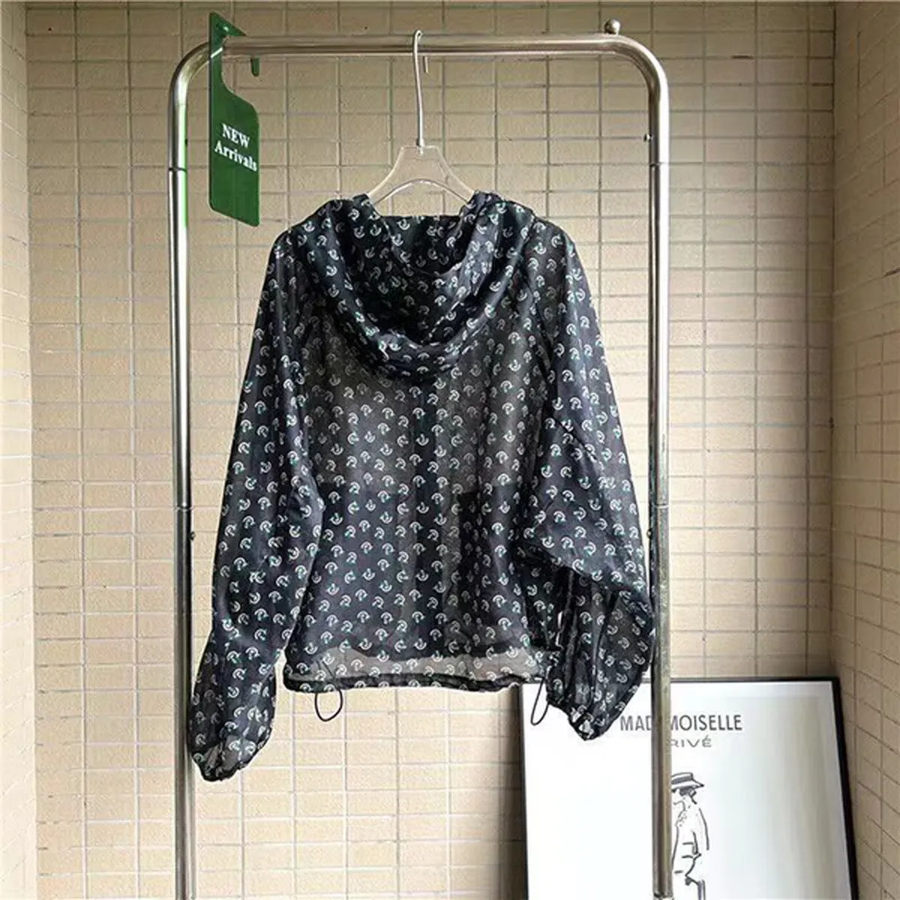 Tellia – Pattern Printed Sheer Hooded Windbreaker