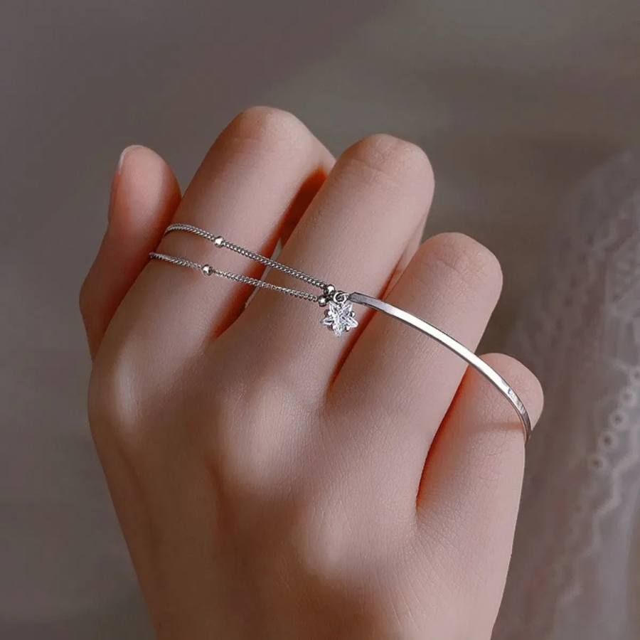 Серебряный браслет с двойной цепочкой и кубиком