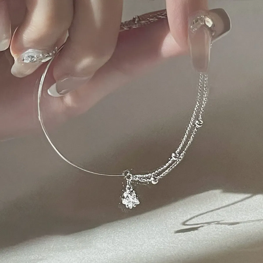 Серебряный браслет с двойной цепочкой и кубиком