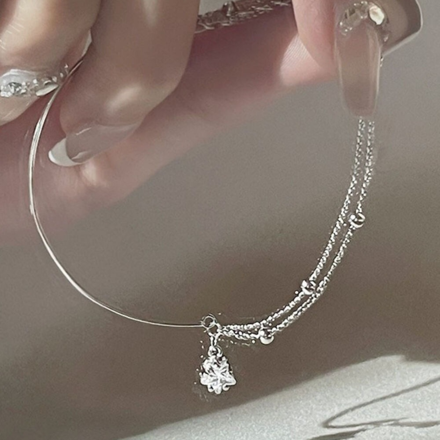 Серебряный браслет с двойной цепочкой и кубиком