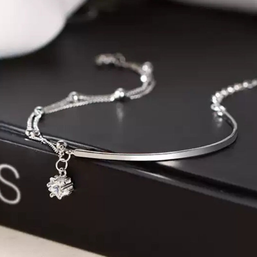 Серебряный браслет с двойной цепочкой и кубиком