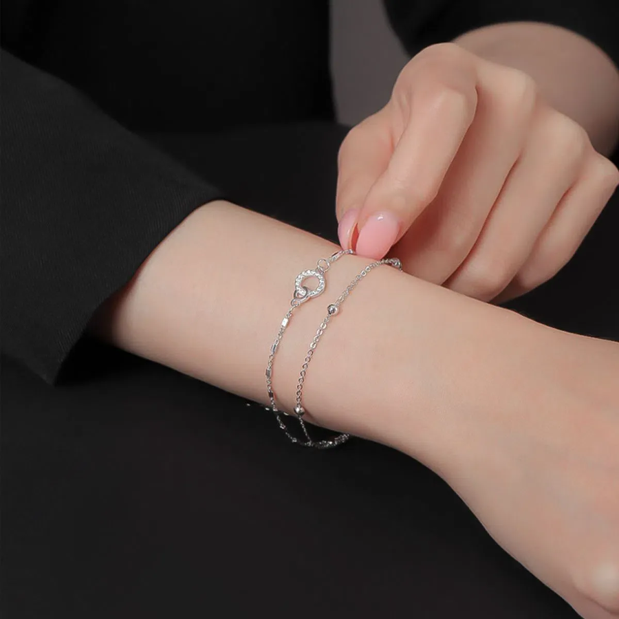 Серебристый браслет с двойным кругом и серебряными бусинами