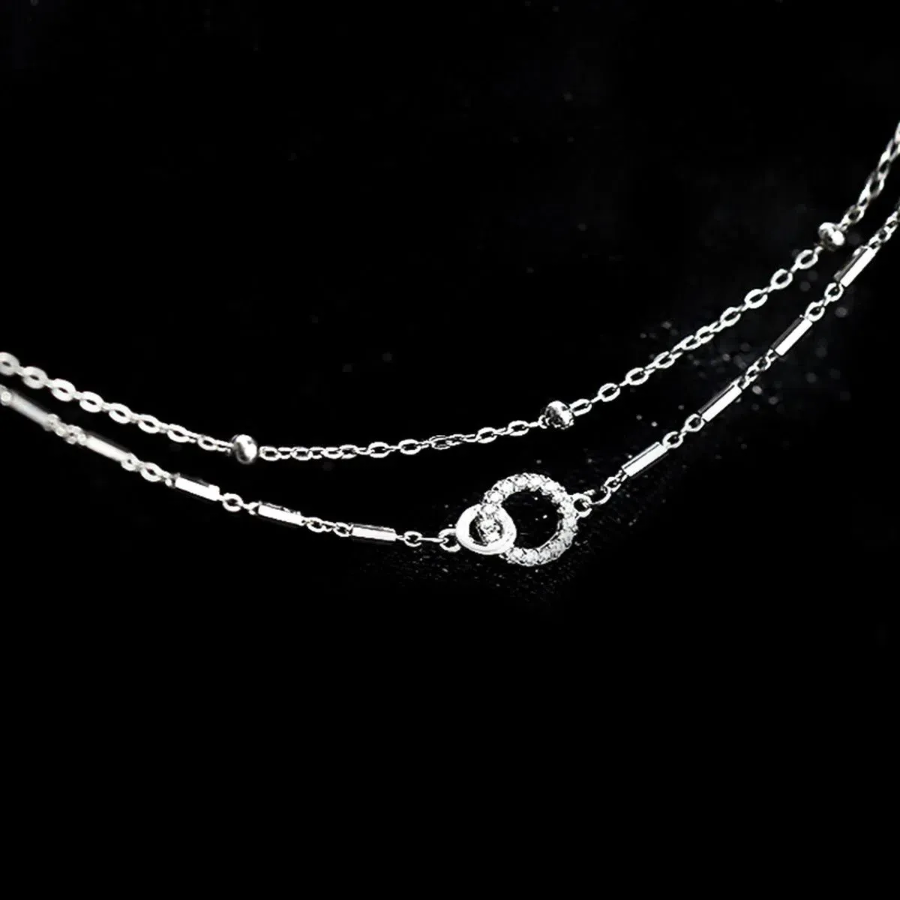 Серебристый браслет с двойным кругом и серебряными бусинами