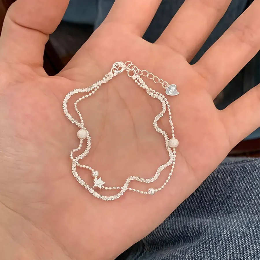 Серебряный браслет с двумя цепочками, звёздочкой и гипсофилой