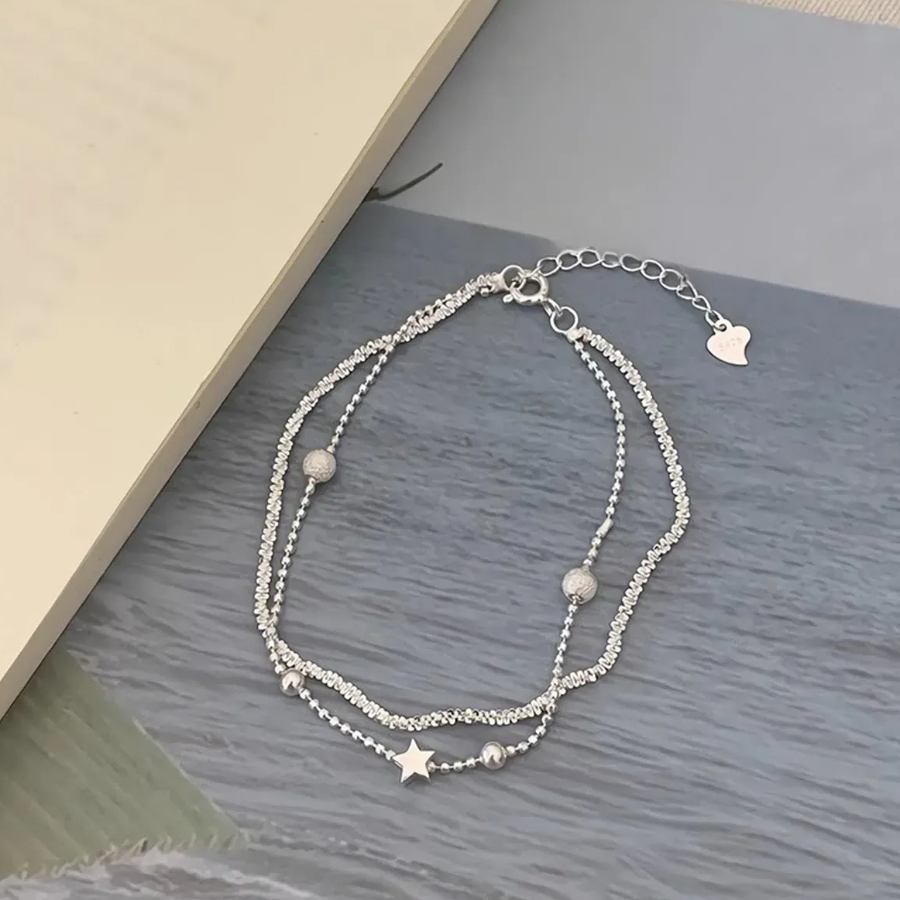 Серебряный браслет с двумя цепочками, звёздочкой и гипсофилой