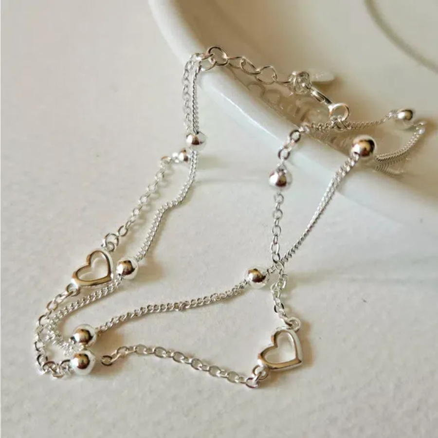 Серебряный браслет 925 пробы с плоской линией из сердец и двойной шариковой цепочкой