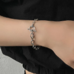 Браслет из хирургической стали с цепочкой и застёжкой в виде косточки (тогл-бар)