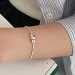 Серебряный браслет с подвеской в форме сердца и бусиной на гладкой цепочке