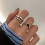 Серебряное кольцо с двойным плетёным узором и чёрной вставкой