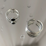 Серебряное кольцо с двойным плетёным узором и чёрной вставкой