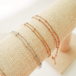 Браслет на ногу с двойной цепочкой и шариками из хирургической стали