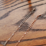 Браслет на ногу с подвеской в виде хвоста дельфина и кристаллом из хирургической стали