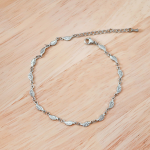 Серебряный браслет на ногу с подвесками в виде листьев