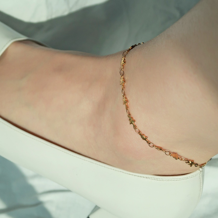 Серебряный браслет на ногу с мини-звёздами на цепочке