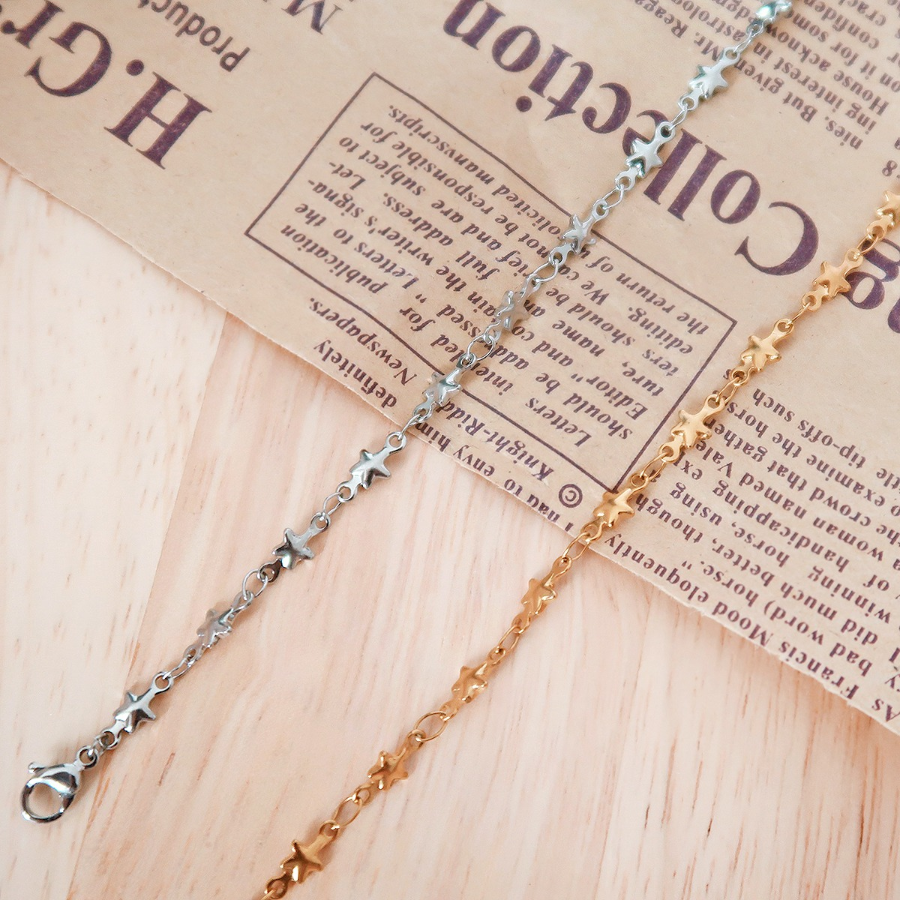 Серебряный браслет на ногу с мини-звёздами на цепочке