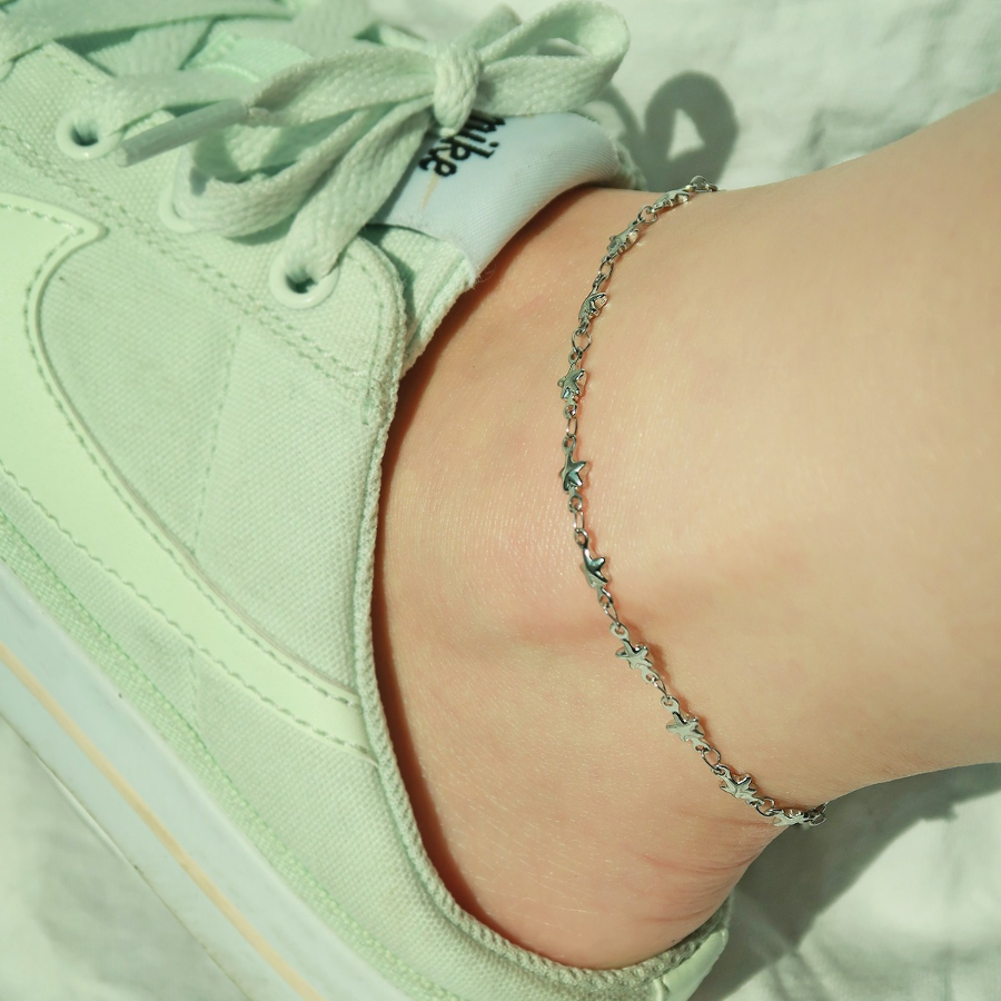 Серебряный браслет на ногу с мини-звёздами на цепочке