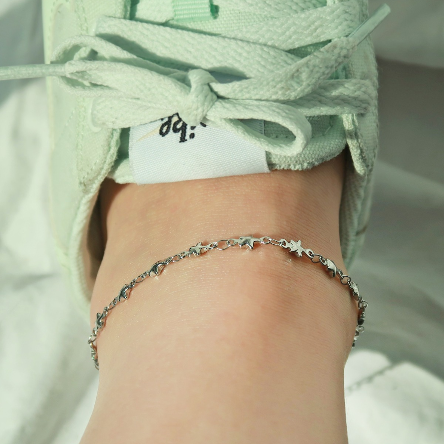 Серебряный браслет на ногу с мини-звёздами на цепочке