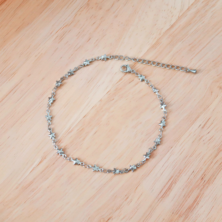 Серебряный браслет на ногу с мини-звёздами на цепочке