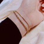 Браслет с двойной цепочкой: скрученная верёвка и змейка