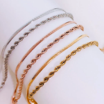 Браслет с двойной цепочкой: скрученная верёвка и змейка