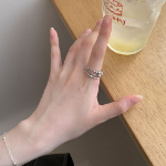 Серебряное открытое кольцо с плетёным узором