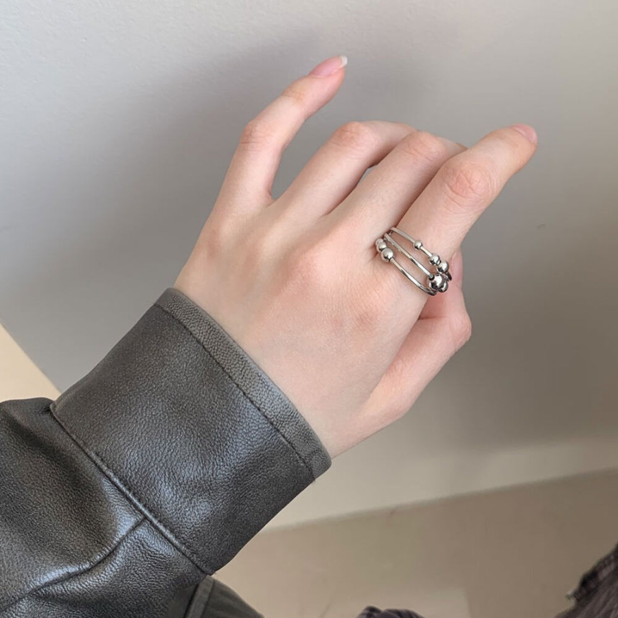 Серебряное открытое кольцо с плетёным узором