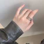 Серебряное открытое кольцо с плетёным узором