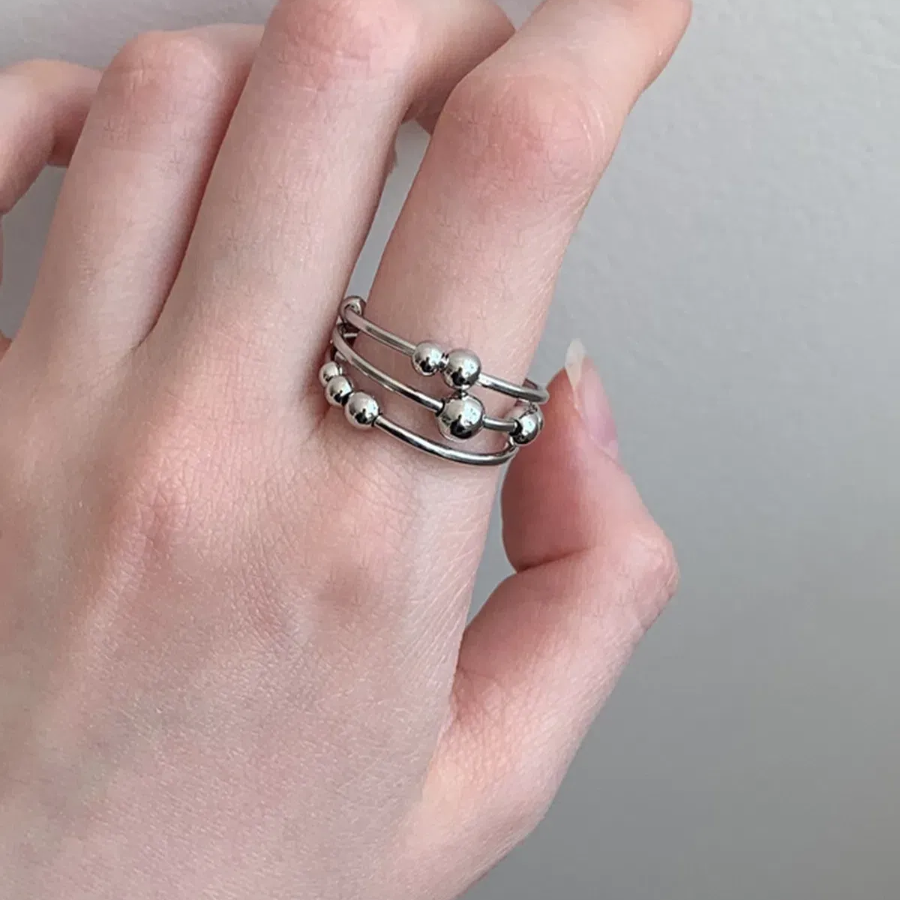 Серебряное открытое кольцо с плетёным узором