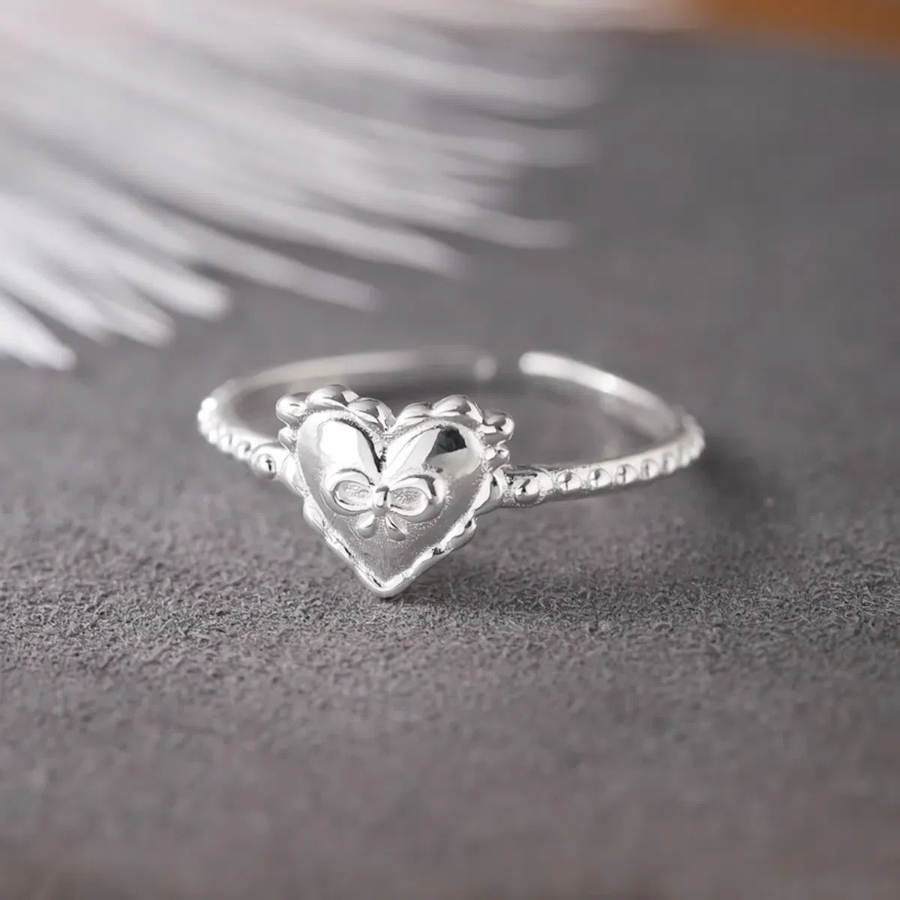 Серебряное открытое кольцо с сердечком и бантиком