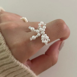 Серебряное кольцо с бантом и жемчужиной