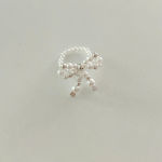 Серебряное кольцо с бантом и жемчужиной