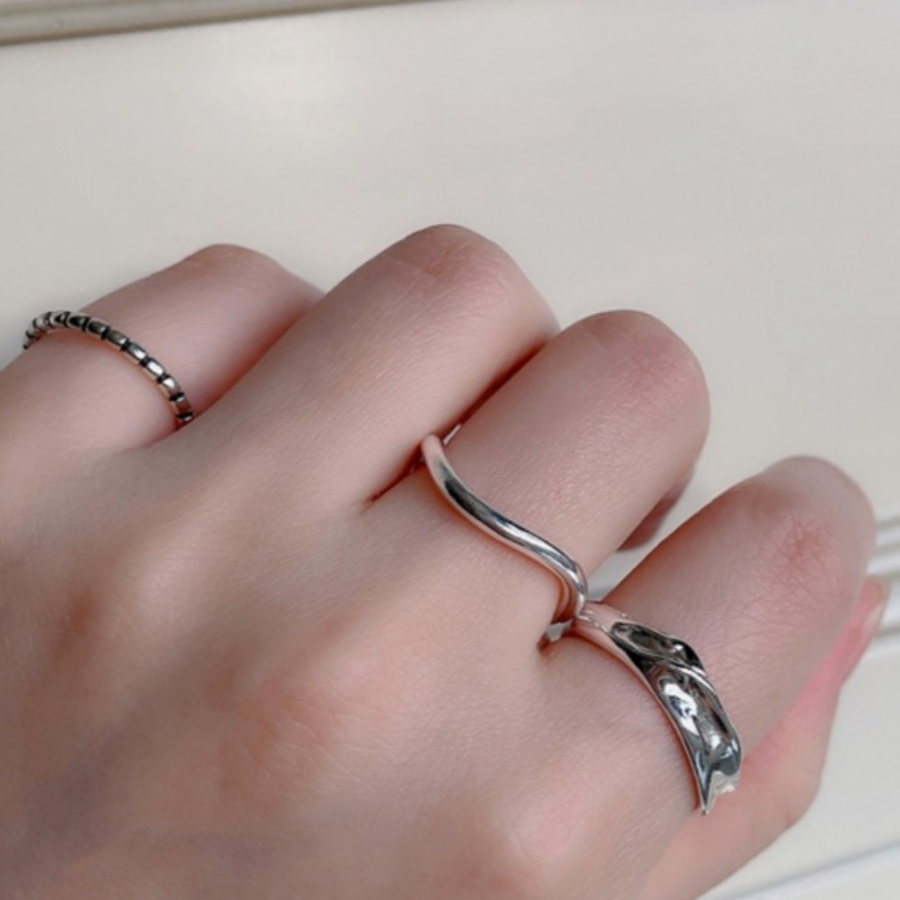 Комплект из трёх серебряных открытых колец с белым покрытием