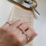 Комплект из трёх серебряных открытых колец с белым покрытием