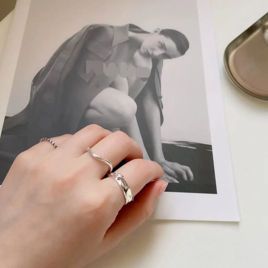 Комплект из трёх серебряных открытых колец с белым покрытием