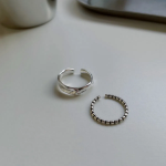 Комплект из трёх серебряных открытых колец с белым покрытием