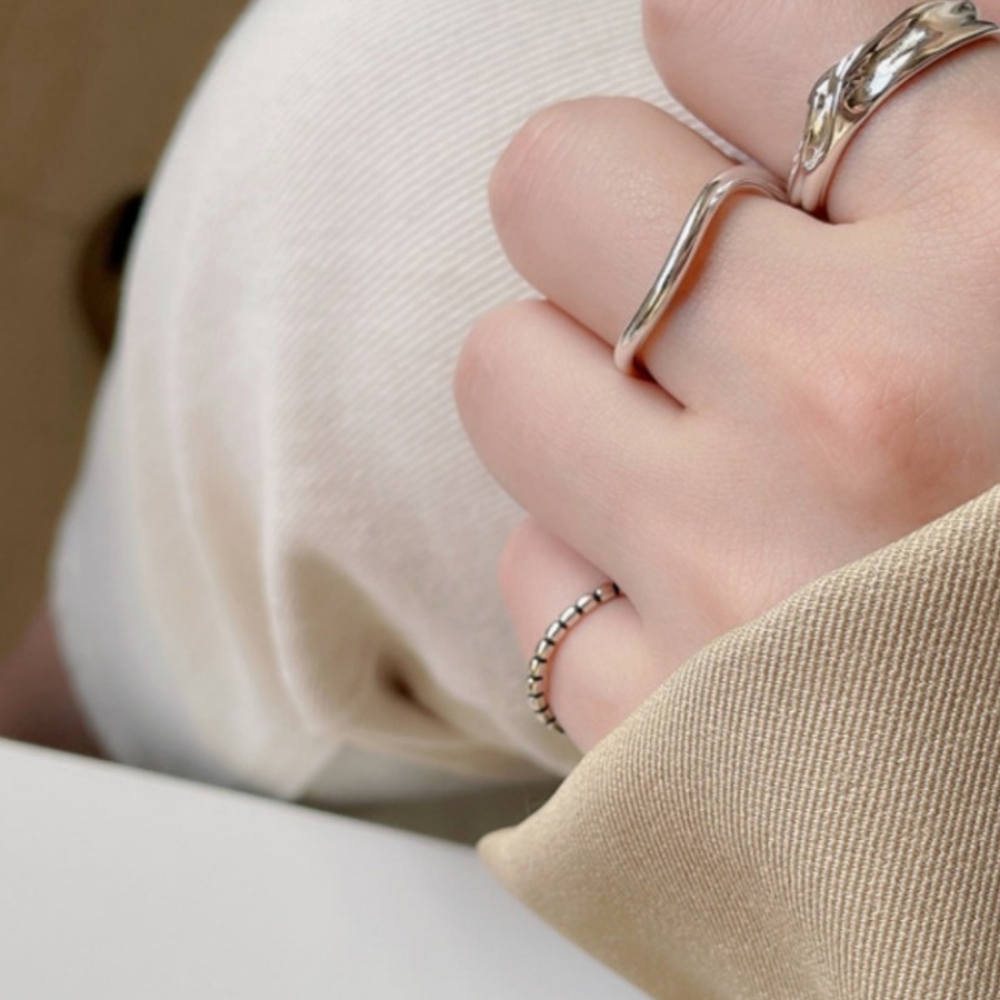 Комплект из трёх серебряных открытых колец с белым покрытием