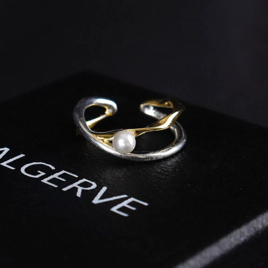 Серебряное открытое кольцо с маленькой жемчужиной и перекрёстным узлом