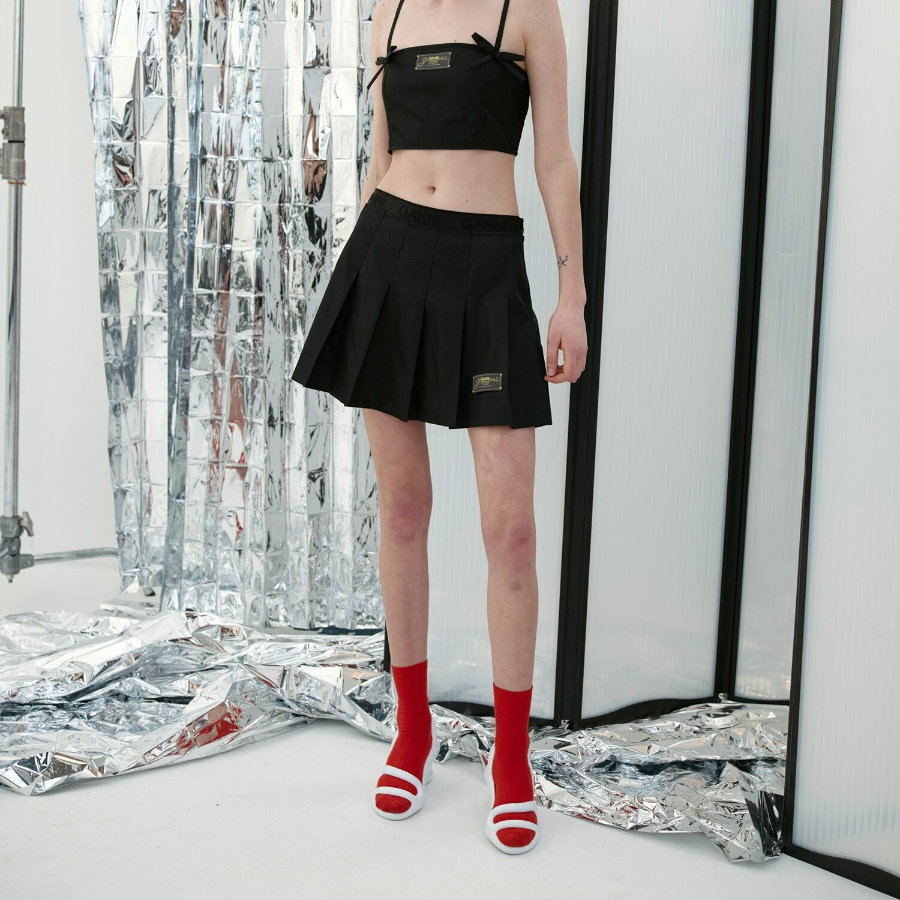 GANNI Duchesse Nylon Pleated Mini Skirt – Black