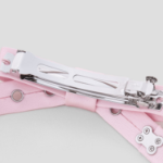 GANNI Eyelet Bow Barrette Satin – Chalk Pink