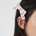GANNI Eyelet Bow Barrette Satin – Chalk Pink
