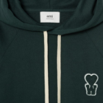 ami (Unisex) WS Patch Hoodie – Dark Green